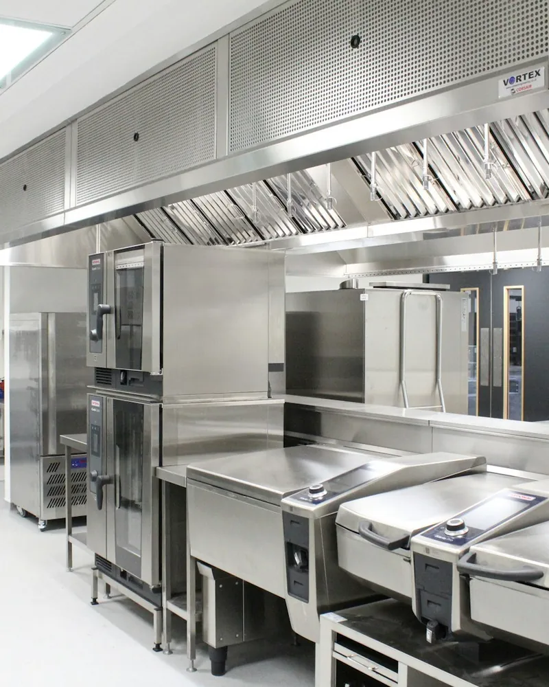 Automatic suppression system over commercial cooking appliances
